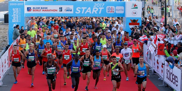 Runners compete in the Beirut Marathon in Beirut, Lebanon, Nov. 12, 2017.