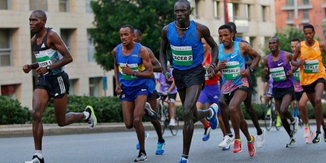 Runners compete in the Beirut Marathon in Beirut, Lebanon, Nov. 12, 2017.