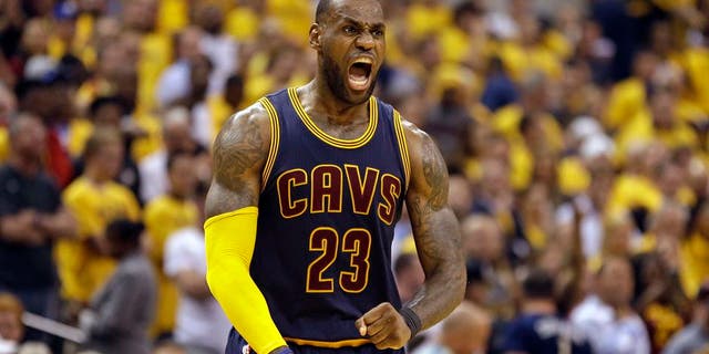 Cleveland Cavaliers forward LeBron James celebrates a basket against the Indiana Pacers during the second half of Game 3 of a first-round NBA basketball playoff series, Thursday, April 20, 2017, in Indianapolis. The Cavaliers defeated the Pacers 119-114. (AP Photo/Michael Conroy)