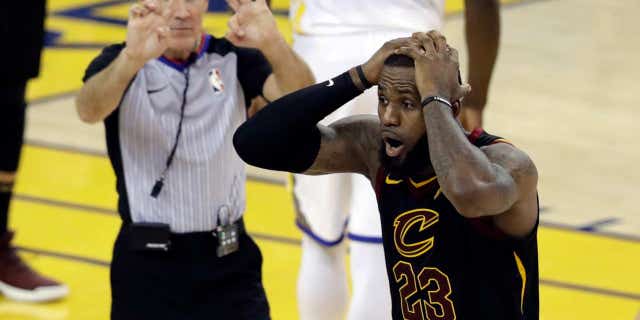 Cleveland's LeBron James was in utter disbelief at the end of regulation play in Game 1, as the Cavaliers missed an opportunity to win the game, in Oakland, Calif., May 31, 2018.