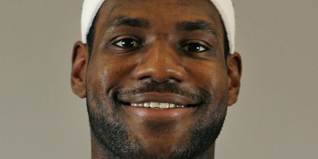 Cleveland Cavaliers' LeBron James poses during NBA basketball team's media day in this Oct. 3, 2009 file photo taken in Independence, Ohio. (AP/Tony Dejak, File)