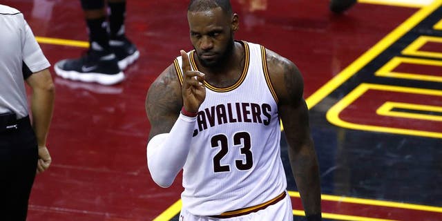 CLEVELAND, OH - JUNE 09: LeBron James #23 of the Cleveland Cavaliers reacts after a play in the second quarter against the Golden State Warriors in Game 4 of the 2017 NBA Finals at Quicken Loans Arena on June 9, 2017 in Cleveland, Ohio. NOTE TO USER: User expressly acknowledges and agrees that, by downloading and or using this photograph, User is consenting to the terms and conditions of the Getty Images License Agreement. (Photo by Gregory Shamus/Getty Images)