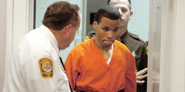 In this Oct. 26, 2004, file photo, Lee Boyd Malvo enters a courtroom in the Spotsylvania, Va., Circuit Court.
