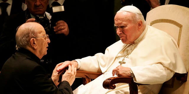 Nov. 30, 2004: Pope John Paul II blesses Father Marcial Maciel during a special audience in Paul VI hall at the Vatican.