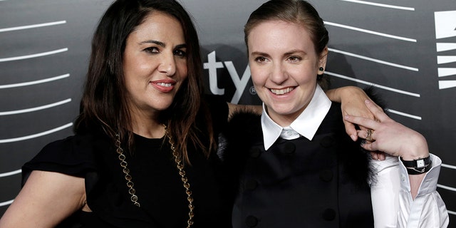 Lena Dunham (R) and Jenni Konner, founders of Lenny Letter, pose as they arrive for the 20th Annual Webby Awards in Manhattan, New York, U.S., May 16, 2016. REUTERS/Mike Segar - S1BETEMANOAA
