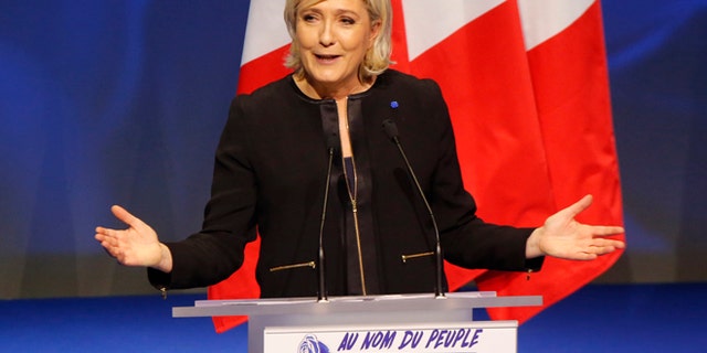 Feb. 5, 2017: Far-right leader presidential candidate Marine Le Pen gestures as she speaks during a conference in Lyon, France.
