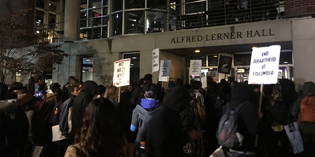 Antifa protesters block the only entrance to a speech on Columbia University's campus by speaker Mike Cernovich.