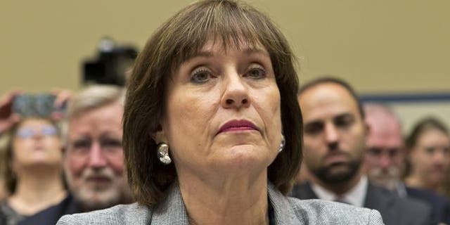 May 22, 2013: Lois Lerner, head of the IRS unit that decides whether to grant tax-exempt status to groups, listens on Capitol Hill in Washington.