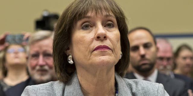 May 22, 2013: Lois Lerner, head of the IRS unit that decides whether to grant tax-exempt status to groups, listens on Capitol Hill in Washington.
