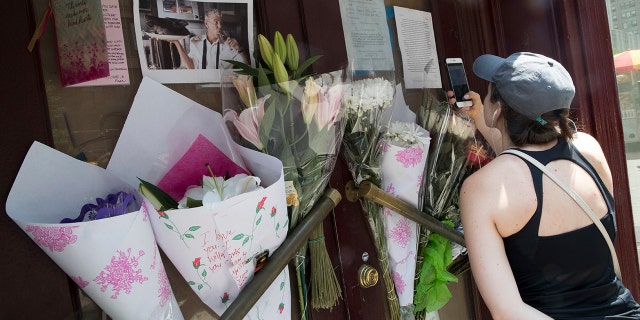 Mourners began paying tribute to Bourdain’s legacy by setting up a memorial outside of the Manhattan restaurant shortly after his passing.