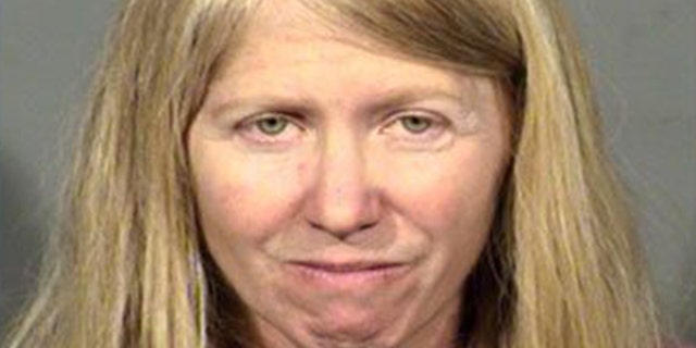 Mugshot for Leslie McGourty charged this month with threatening to shoot up a concert.