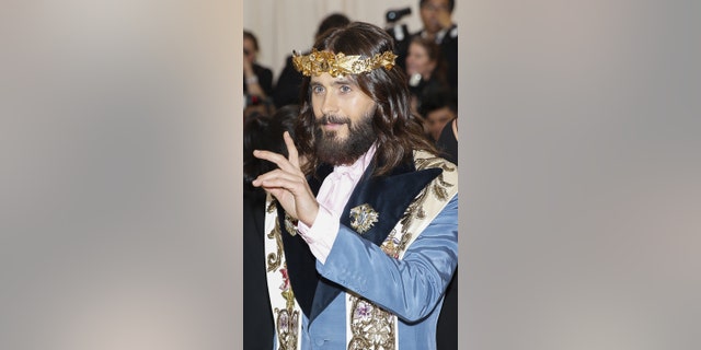 Actor Jared Leto mimics Jesus Christ in Gucci Met Gala outfit.