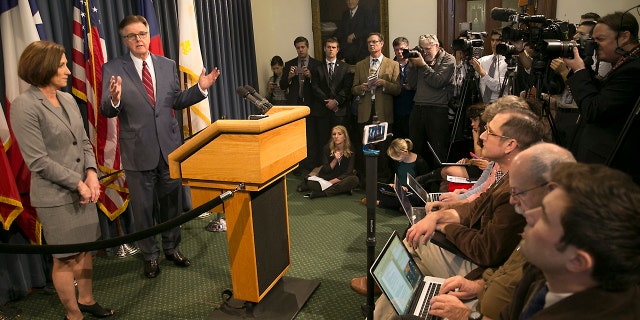 Texas Lt. Gov. Dan Patrick and Senator Lois Kolkhorst introduced Senate Bill 6 known as the Texas Privacy Act, which provides solutions to the federal mandate of transgender bathrooms, showers and dressing rooms in all Texas schools. The two legislators answer questions from a press availability Thursday, Jan. 5, 2017, in the Senate Conference room at the State Capitol in Austin, Texas. (Ralph Barrera/Austin American-Statesman via AP)