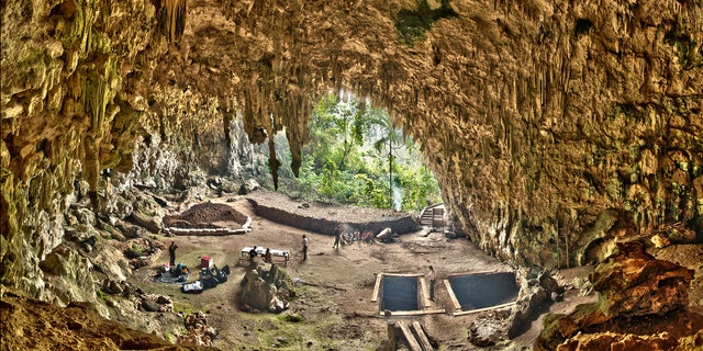 Liang Bua, a limestone cave on the Indonesian island of Flores. The Liang Bua Team prepares for new archaeological excavations. (Smithsonian Digitization Program Office / Liang Bua Team)