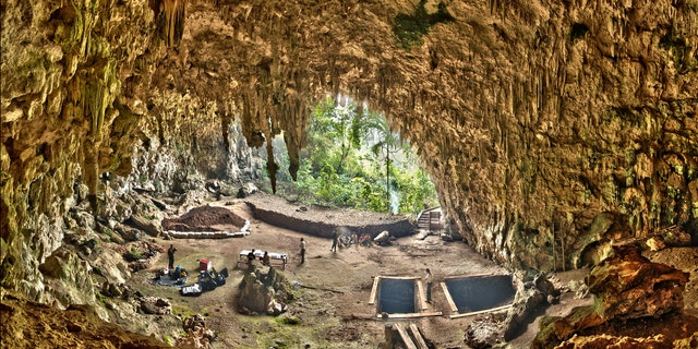 Liang Bua, a limestone cave on the Indonesian island of Flores. The Liang Bua Team prepares for new archaeological excavations. (Smithsonian Digitization Program Office / Liang Bua Team)