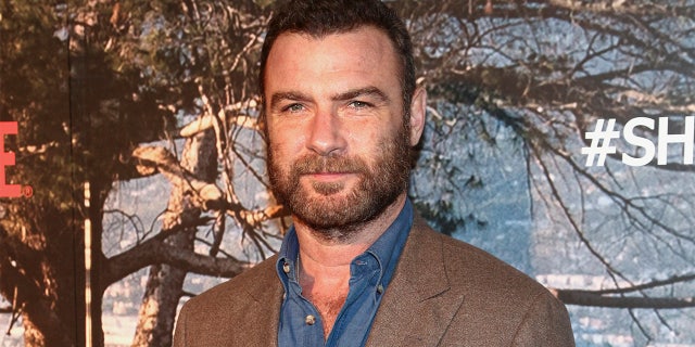 FILE- In this April 18, 2018 file photo, actor Liev Schreiber attends the premiere of Showtime's "Ray Donovan" season six in New York. On Wednesday, Sept. 19, 2018, a suburban New York judge dismissed charges against Schreiber for allegedly attacking a photographer while the actor was filming his popular Showtime series. (Photo by Andy Kropa/Invision/AP, File)
