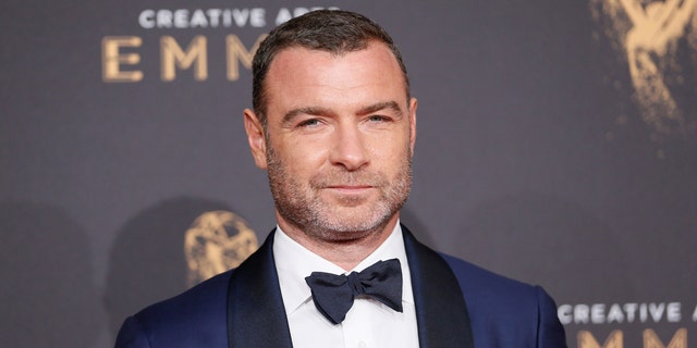 Liev Schreiber poses on the carpet at the 2017 Creative Emmy Awards in Los Angeles. 