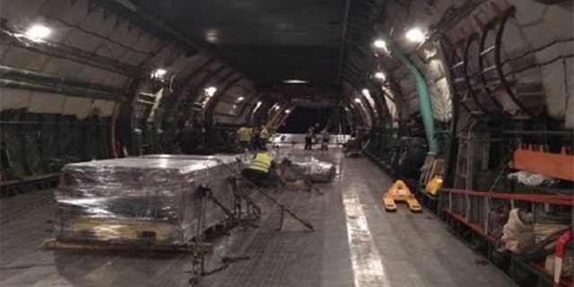 The Russian cargo plane is one of the only ones powerful enough to carry a load as heavy as Ford's.