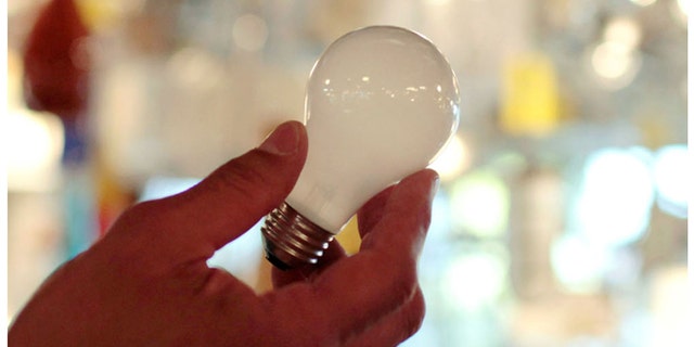 A 100-watt incandescent light bulb seen at Royal Lighting in Los Angeles on Jan. 21, 2011 -- before the bulbs were banned by a 2007 law.