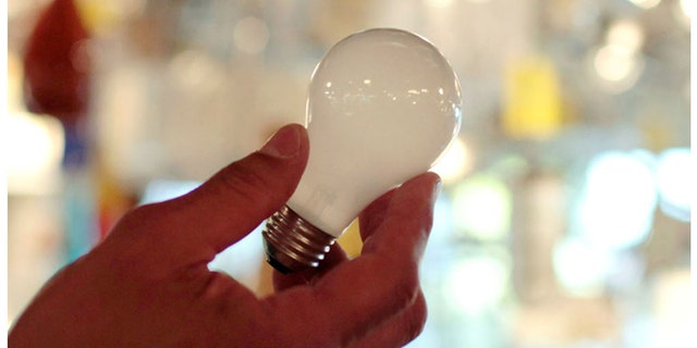 A 100-watt incandescent light bulb seen at Royal Lighting in Los Angeles on Jan. 21, 2011 -- before the bulbs were banned by a 2007 law.