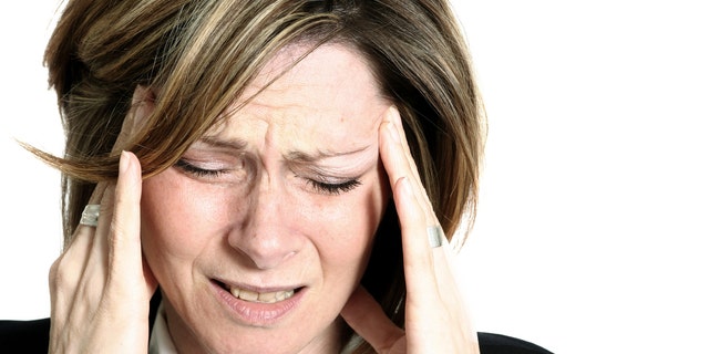 businesswoman with headache