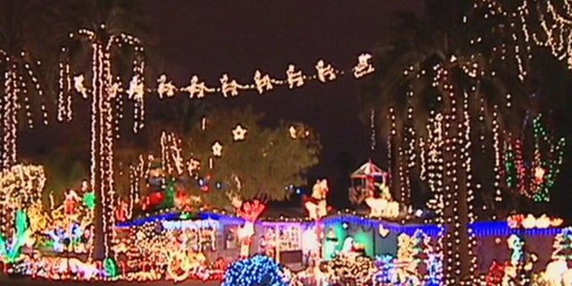 Lee Sepanek says complaints from homeowners and demands from Phoenix officials have discouraged him from setting up his annual Christmas display.