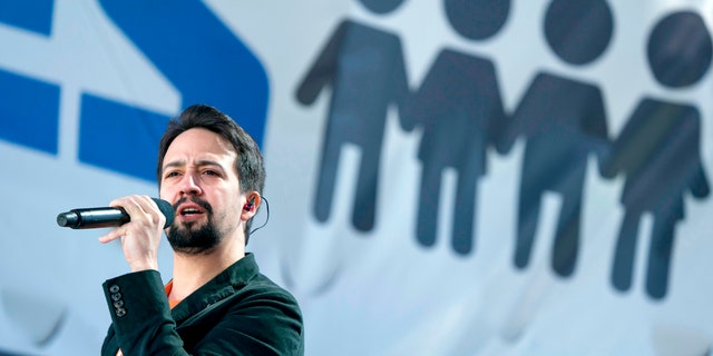 FILE - In this March 24, 2018 file photo, Lin-Manuel Miranda performs "Found Tonight" during the "March for Our Lives" rally in support of gun control in Washington.  Miranda thought he had a migraine. But the Broadway star says itÃ¢â¬â¢s really shingles.  Miranda tweeted on Thursday, April 6, the diagnosis was caught early, but heÃ¢â¬â¢s been quarantined from his 8-week-old son.   (AP Photo/Andrew Harnik, File)