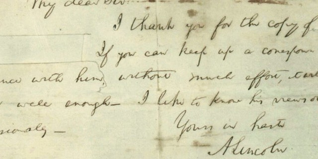 This photo provided by Papers of Abraham Lincoln project shows a note written by Abraham Lincoln.