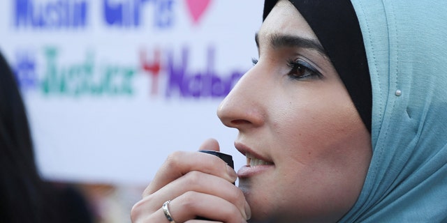 Activist Linda Sarsour addresses attendees at a vigil for Nabra Hassanen, a 17 year old teenage Muslim girl killed by a bat-wielding motorist near a Virginia mosque, Manhattan, New York, U.S., June 20, 2017. Picture taken June 20, 2017. REUTERS/Amr Alfiky - RTS188WI