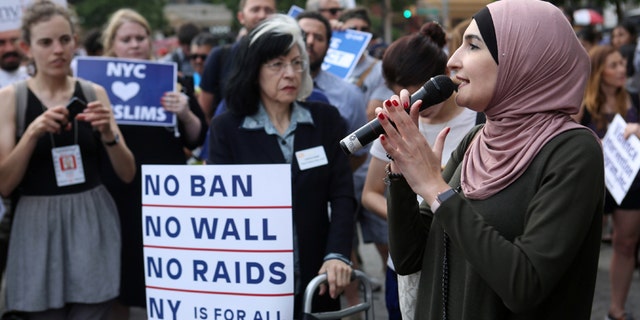 Activist Linda Sarsour speaks at a protest against U.S. President Donald Trump's limited travel ban, approved by the U.S. Supreme Court, in New York City, U.S., June 29, 2017. REUTERS/Joe Penney - RTS19726