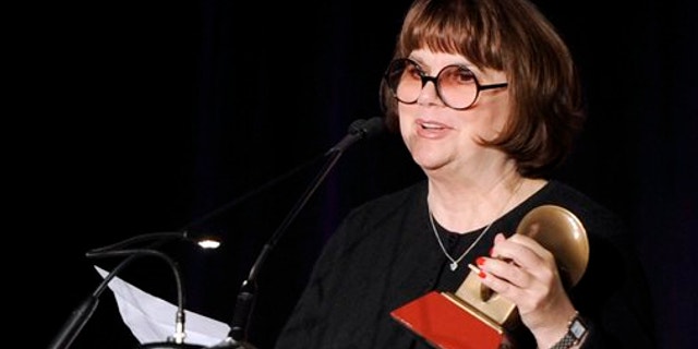 FILE: Nov. 9, 2011: Linda Ronstadt accepts the Life Time Achievement award at the Latin Recording Academy Lifetime Achievement Award and Trustees Award ceremony in Las Vegas.