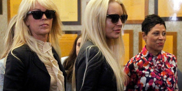 The Lohan family matriarch officially lost the house when she failed to show up to court to respond to JPMorgan Chase’s lawsuit for foreclosure.