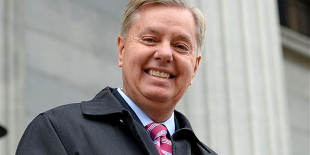 FILE - In this Jan. 14, 2015 file photo, Sen. Lindsey Graham, R- S.C., walks down the steps of the State Capitol building in Columbia, S.C. Republican presidential candidate Lindsey Graham has announced Monday he is ending his bid for the GOP nomination. (AP Photo/Richard Shiro)