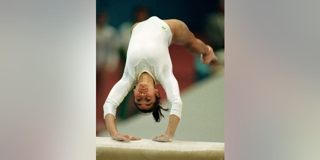 Lisa Skinner, of Australia, performs her vault exercise in 1997. She became a Cirque du Soleil performer and was injured during a performance in 2016.