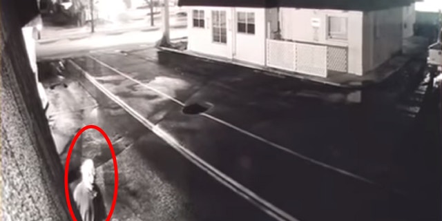 Surveillance video showed the suspect wearing a clown mask approaching the Little Caesars in Holly Hill.