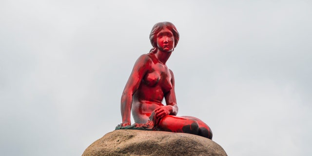 The Little Mermaid statue is seen painted in red in what local authorities say is an act of vandalism, in Copenhagen, Denmark May 30, 2017. Ida Marie Odgaard/Scanpix Denmark/via REUTERS    ATTENTION EDITORS - THIS IMAGE WAS PROVIDED BY A THIRD PARTY. FOR EDITORIAL USE ONLY. DENMARK OUT. NO COMMERCIAL OR EDITORIAL SALES IN DENMARK      TPX IMAGES OF THE DAY - RTX386ZI