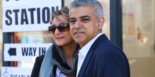 London mayoral candidate Labour Party's Sadiq Khan arrives with his wife Saadiya to cast their votes at a polling station in Streatham, south west London, Thursday May 5, 2016. (Philip Gareth Fulller/PA via AP) UNITED KINGDOM OUT NO SALES NO ARCHIVE