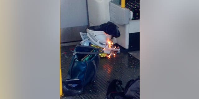 In this image made from video, fire raises at a southwest London subway station in London Friday, Sept. 15, 2017. London's Metropolitan Police and ambulance services are confirming they are at the scene of "an incident" at the Parsons Green subway station in the southwest of the capital. The underground operator said services have been cut along the line. (@RRIGS via AP)
