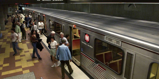 Passengers get off a Metro Red Line subway train at the Hollywood and Vine station in Hollywood. Metro may add portable showers at some stations across the system.