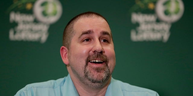 Richard Wahl speaks during a news conference introducing him as the $533 million Mega Millions jackpot winner at the New Jersey Lottery headquarters, Friday, April 13, 2018, in Trenton, N.J. Wahl hit the winning numbers during the Friday, March 30 drawing on a ticket he bought at a gas station in Riverdale, N.J. (AP Photo/Julio Cortez)