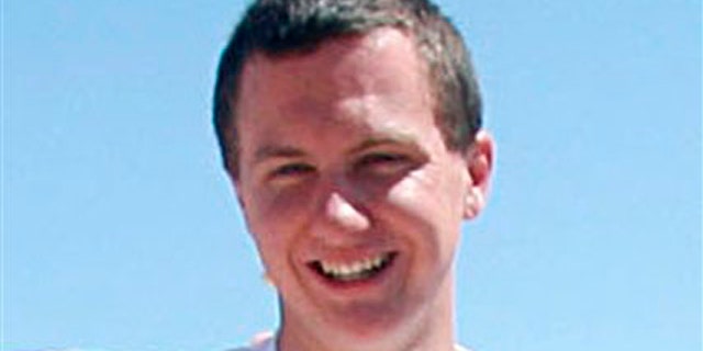 This March 2010 photo shows a man identified as Jared L. Loughner at the 2010 Tucson Festival of Books in Tucson, Ariz.