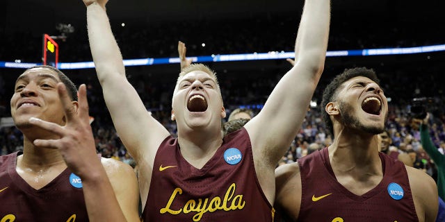 Loyola-Chicago players celebrate their Final Four berth after Saturday's win over Kansas State, in Atlanta, March 24, 2018.