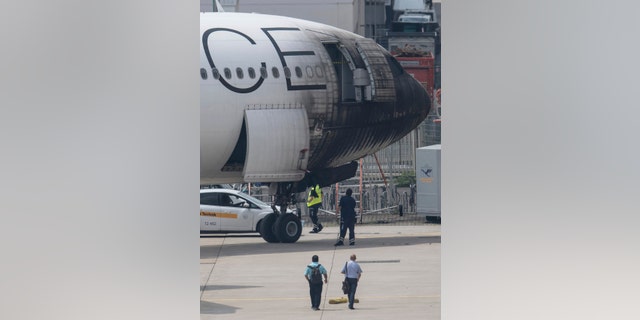 The airline says it isn't clear how the fire broke out Monday morning.