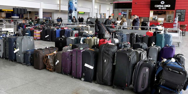 A water main break at JFK airport resulted in flooding, delayed flights, and power and heat outages. Some passengers were also forced to abandon their luggage.