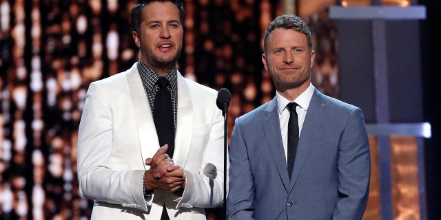 Luke Bryan (L) and Dierks Bentley host the 52nd Academy of Country Music Awards in Las Vegas, Nevada on April 2, 2017.