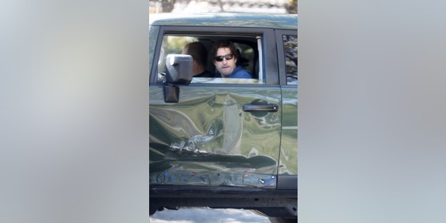Luke Wilson is seen driving his SUV following the crash.