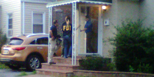 July 19, 2011: FBI agents execute a search warrant at the Long Island, NY, home of a suspected member of notorious hacking group Anonymous.