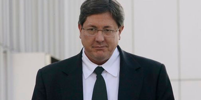 FILE - In this Jan. 21, 2015 file photo, Lyle Jeffs leaves the federal courthouse in Salt Lake City. On Tuesday, Feb. 23, 2016, several top leaders from Warren Jeffs' polygamous sect, including Lyle Jeffs, were arrested on federal accusations of food stamp fraud and money laundering marking one of the biggest blows to the group in years. (AP Photo/Rick Bowmer, File)
