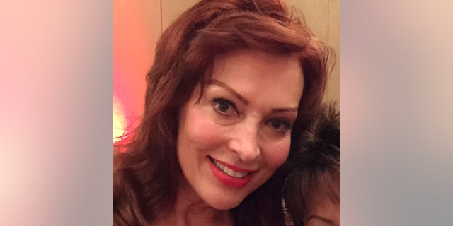 In this photo taken June 6, 2015, former CNN Headline News anchor Lynne Russell poses for a photo during the CNN 35th anniversary reunion in Atlanta. (AP Photo)