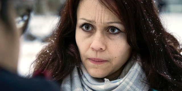 Lyudmila Savchuk, former troll and researcher, speaks to journalists in St.Petersburg, Russia, Monday, Feb. 19, 2018.